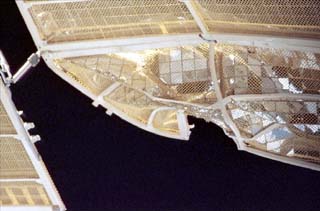 The damaged Spektr solar array, viewed from a window on the Mir Space Station during NASA-6. 